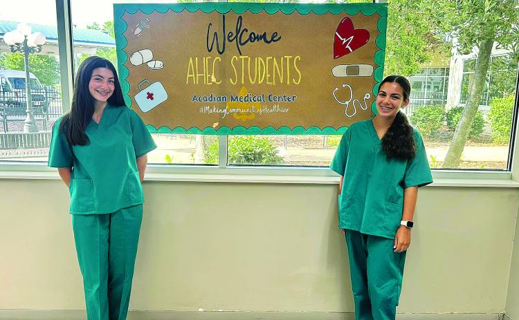 St. Edmund students Madeline Pitre and Sadie Spell began the AHEC Summer Careers Volunteer Program at Acadian Medical Center. 