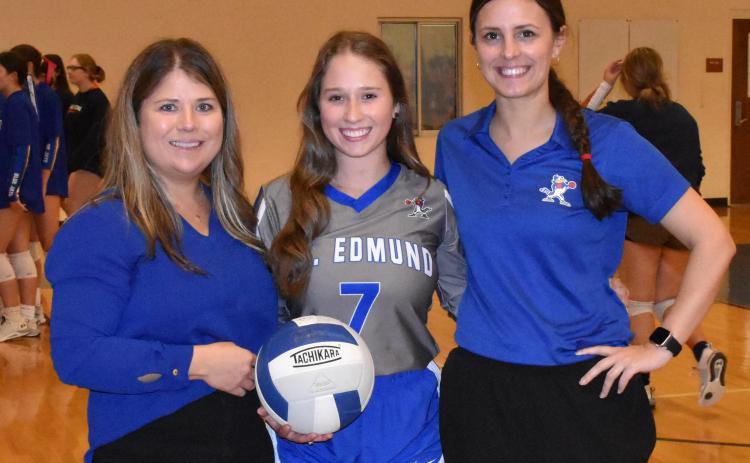Aassistant coach Courtney Smith, senior Caroline Trahan and head coach Brittany Thibodeaux.