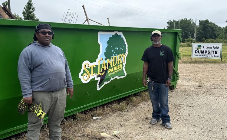 St. Landry Parish Government Public Works employees Jeremiah Champ and Chris Carrier manned the station today to make sure operations went smoothly. (Photos by Rebecca Chaisson)